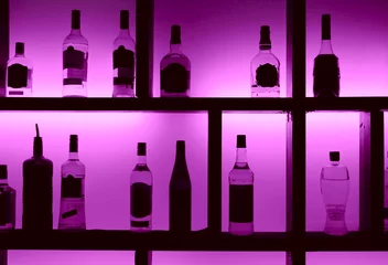  Back lit bottles in a cocktail bar © Kondor83