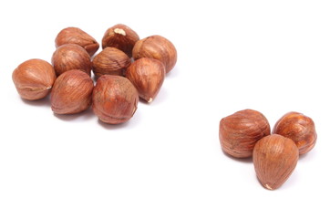 Fototapeta premium Heap of hazelnut on white background