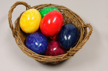colorful easter eggs in a basket