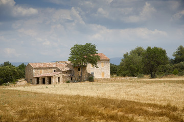 Lonely house stands in the middle of a field in Provence