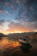 Small boat floats moored in Perast. Bay of Kotor, Montenegro
