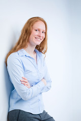 Smiling Businesswoman with Folded Arms