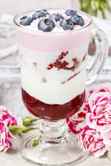 Yogurt dessert with summer fruits: strawberries, raspberries