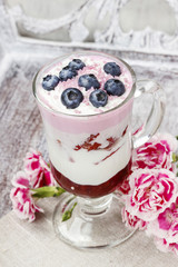 Yogurt dessert with summer fruits: strawberries, raspberries