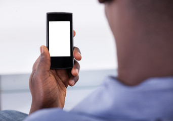 Person Holding Mobile Phone