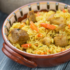 Close-up of pilaf in a ceramic plate