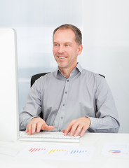 Fototapeta premium Businessman Using Computer