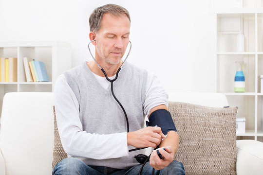 Man Checking Blood Pressure