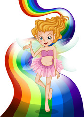 A fairy standing at the rainbow
