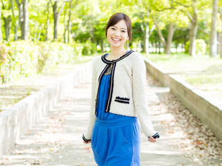 young asian woman relaxing in the park