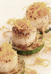 Pan fried scallops with citrus zest