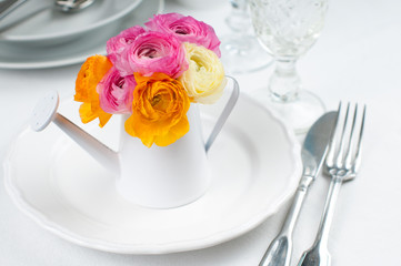 Festive table setting with flowers