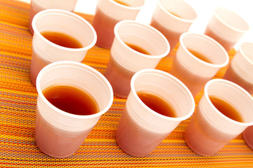 Disposable cups with tea