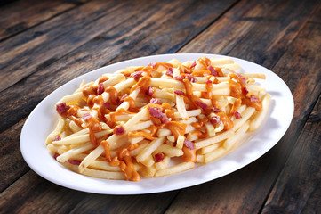 French fries with bacon cubes