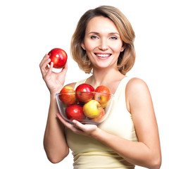 Portrait of a young woman with apples.