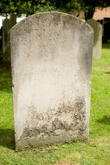Blank Headstone In Graveyard