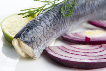 Fillet herring with onion and lemon