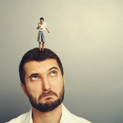 woman screaming at young man