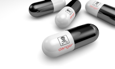 gelatin capsules  with the word danger