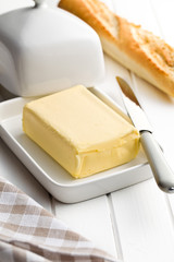 cube of butter with bread