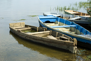 Obraz premium Old boat on the river