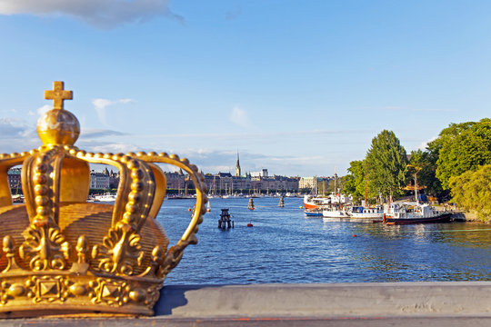 Stockholm, Sweden. View of the embankment and the symbol of Swed
