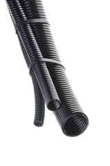 Black plastic corrugated pipe isolated on white background