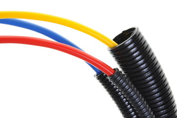 Power supply cables in corrugated pipe isolated on white 