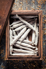 Wooden box with handmade cigarettes