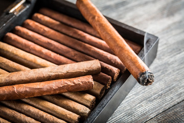 Burning with smoke on wooden humidor