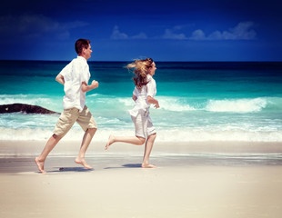 man and woman romantic couple on tropical beach