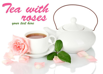 Teapot and cup of tea with rose isolated on white