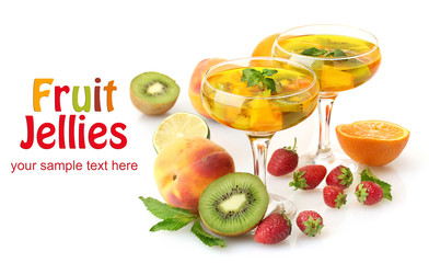 Punch in glasses with fruits, isolated on white