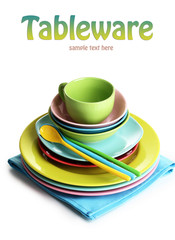 Colorful plates on napkin isolated on white