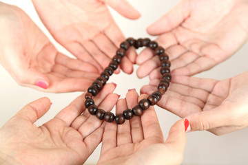 Muslim praying hands on light background