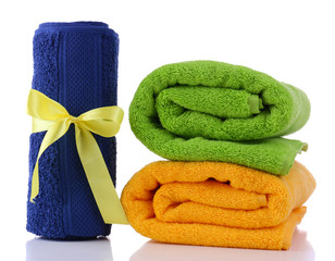 Colorful towels isolated on white