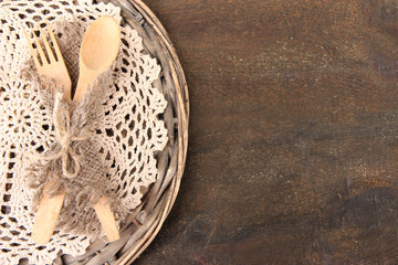 Spoon and fork on wooden table