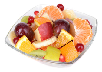 Sweet fresh fruits in bowl isolated on white