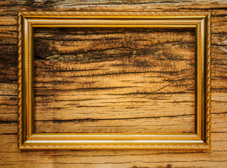 Blank Picture Frame on wooden wall