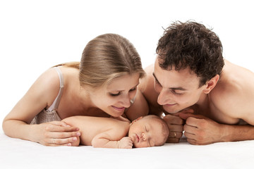 Obraz na płótnie Canvas Young caucasian couple with one week old boy