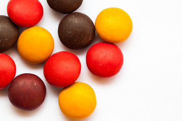 Close up of a pile of colorful chocolate coated candy