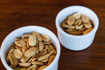 Salted peanuts. Nuts in a Small Bowl