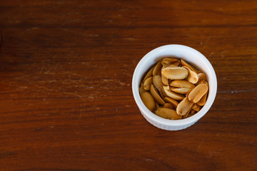 Salted peanuts. Nuts in a Small Bowl