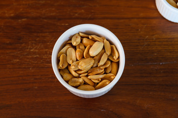 Salted peanuts. Nuts in a Small Bowl