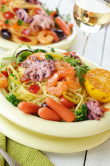 Seafood spaghetti pasta dish with octopus and shrimps