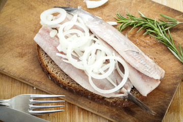 Portion of typical Dutch herring on bread