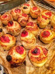 Obraz na płótnie Canvas Little focaccia muffins with tomatoes