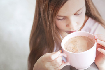 Child drinking cocoa