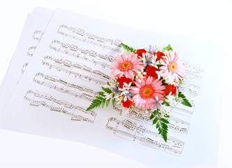 music score and bouquet