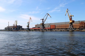 Fototapeta na wymiar cranes on port